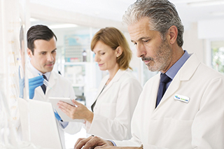 group of lab techs in discussion