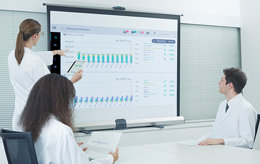 Lab techs analyzing data